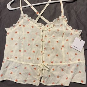 NEW with tags!! Super cute for summer O’Neill top. Cries cross back straps.